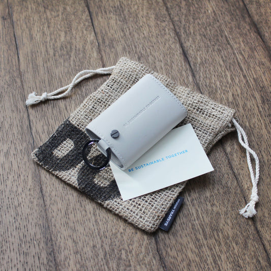 ESG 기업 굿즈 | 현대트랜시스 콜라보 리사이클 가죽 키링 + 업사이클링 마대 파우치 세트